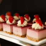 Close up of pink dessert in bite size pieces on a plate as part of mercure hotels meeting food offering