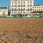 Exterior shot of Mercure Brighton Seafront Hotel from the pebble beach