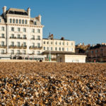 Exterior shot of Mercure Brighton Seafront Hotel from the pebble beach