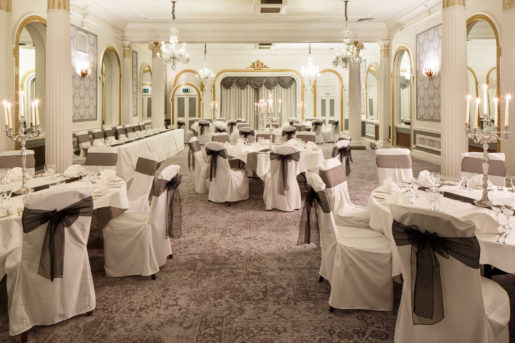 The Ballroom at Mercure Brighton Seafront Hotel arranged for a Wedding Breakfast, grey and silver colour theme