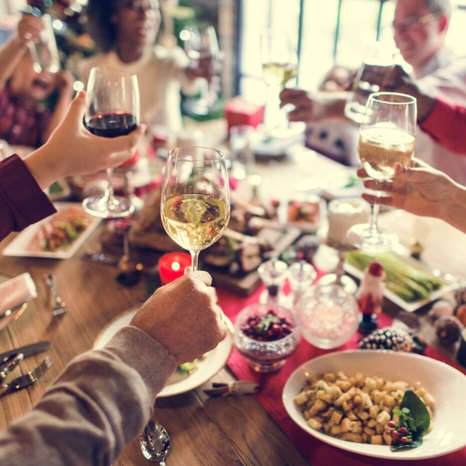 family sitting round or meal at restaurant