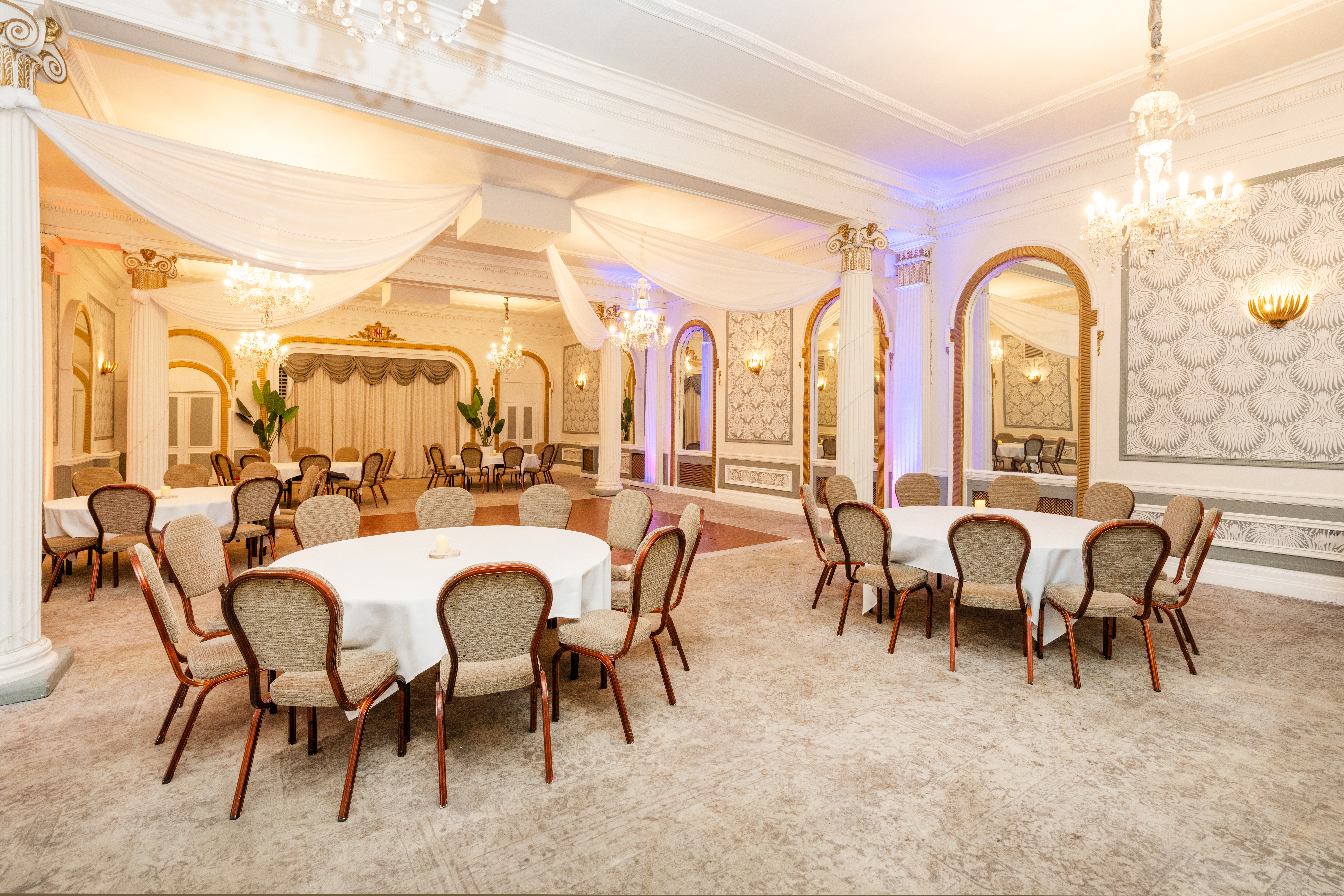 The Ballroom at Mercure Brighton Seafront Hotel, arranged for a meeting, closeup of table, Mercure-branded notepaper on table